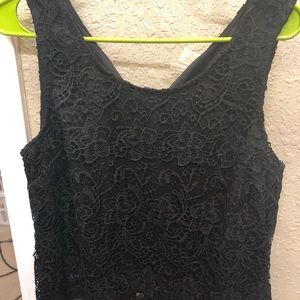 Black top with lace detail and zipper back